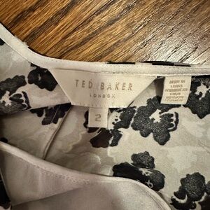 Worn ONE time and dry cleaned.